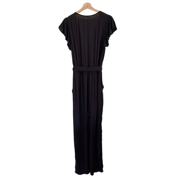 Free People Ruffle Your Feathers Deep V Flutter Sleeve Jumpsuit Black XS - Picture 6 of 13